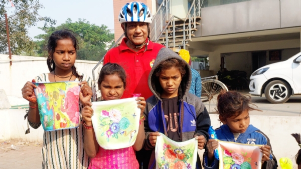 A 68-year-old man, practicing as a chartered accountant, spreads happiness among children living on a construction site in Vadodara city