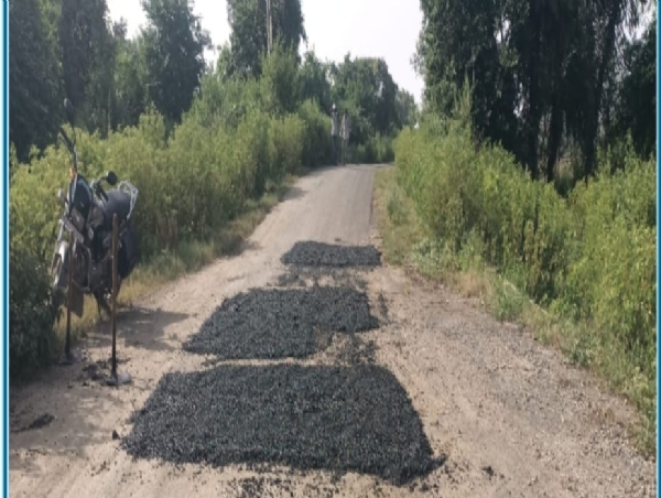 Asphalt patchwork work on Fereda Approach Road