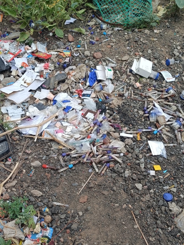 Photos of medical waste dumped near Radhakunj Society near Doctor House in Modasa go viral