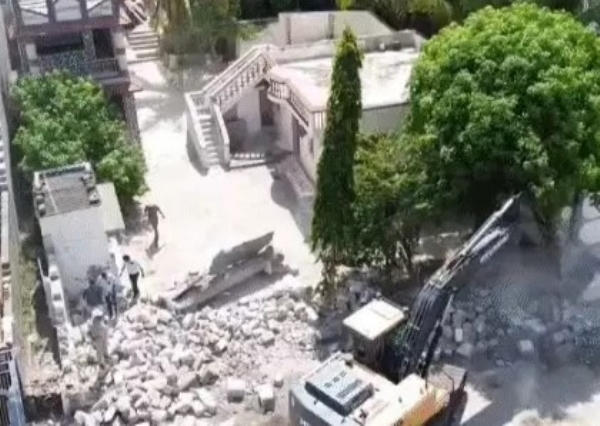 Bulldozer rolls over notorious illegal bungalow worth Rs 1 crore on government land in Bhayavadar, Rajkot district