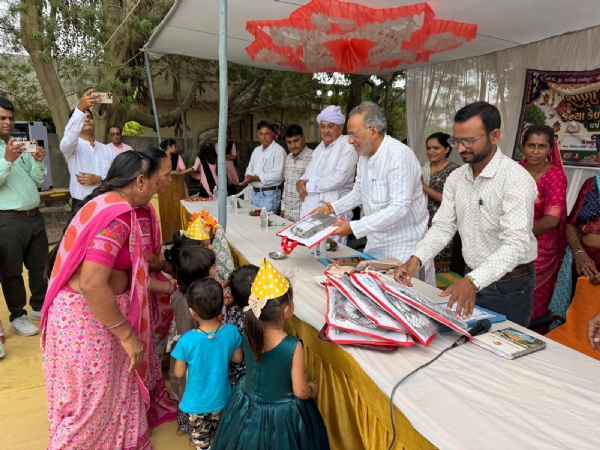 Forest Minister Arjun Modhwadia admitted children to school on the second day at Modhwadia