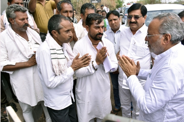 Forest Minister Arjun Modhwadia meets the grieving family of a child killed in a lion attack in Chaturia village of Khambha