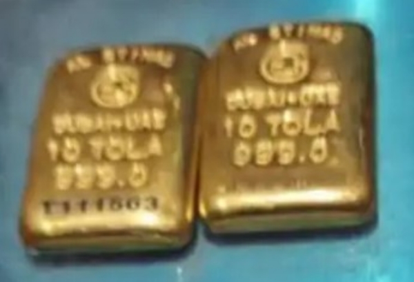 Gold worth Rs34 lakhs seized from inside female passengers burqa at Ahmedabad airport Gold worth Rs34 lakhs seized from inside female passengers burqa at Ahmedabad airport