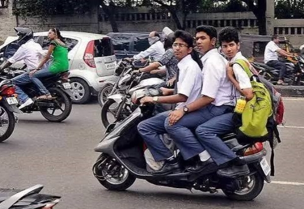 file photo students going on two wheeler to schools in the city