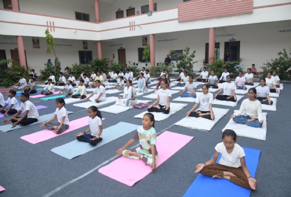 Governor Acharya Devvrat practiced yoga with students